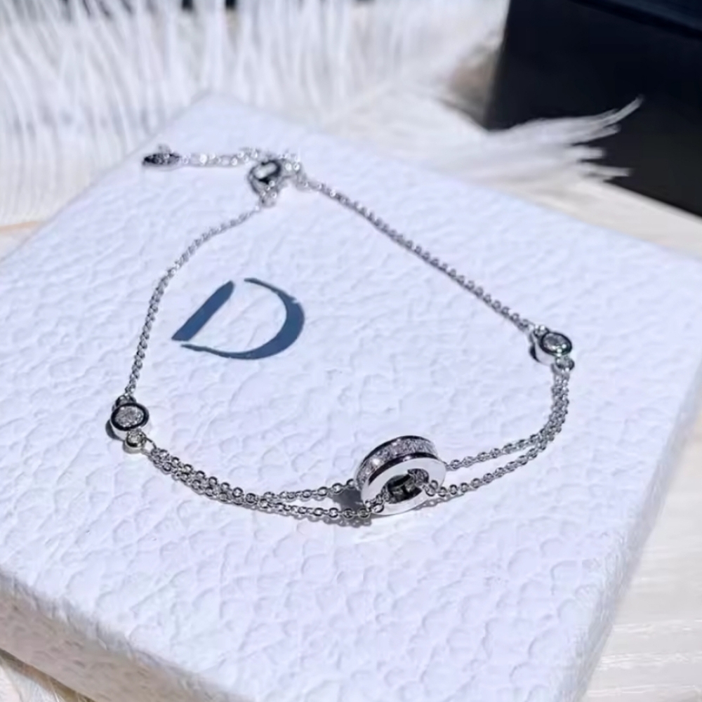 Minimalist Silver Bracelet with Stone-Studded Centerpiece